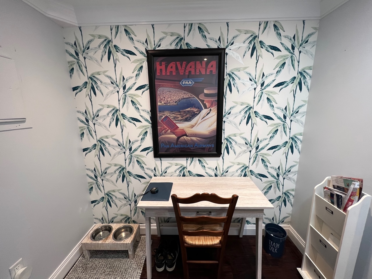 Sunroom with botanical leaves wallpaper installation